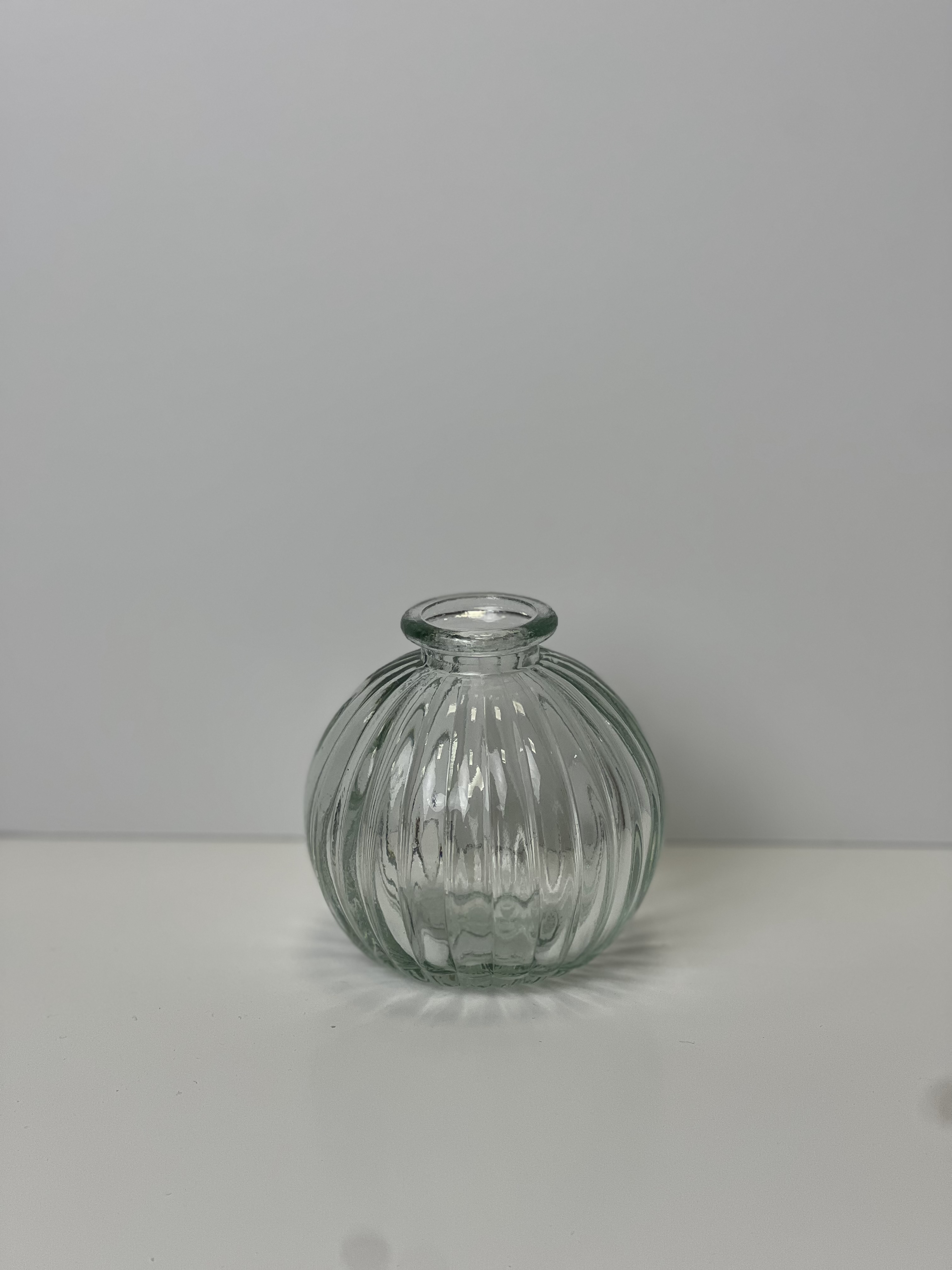Clear Round Bottle detail page